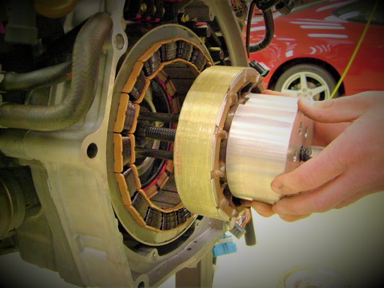 Rotor being removed from a Honda IMA system.